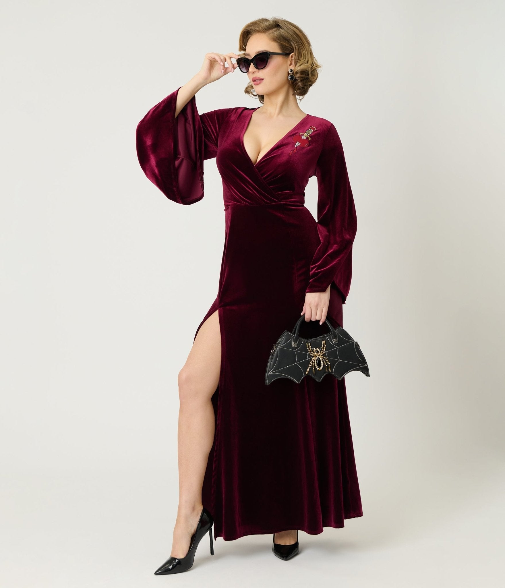 Elvira x Unique Vintage Burgundy Dagger Velvet Maxi Dress